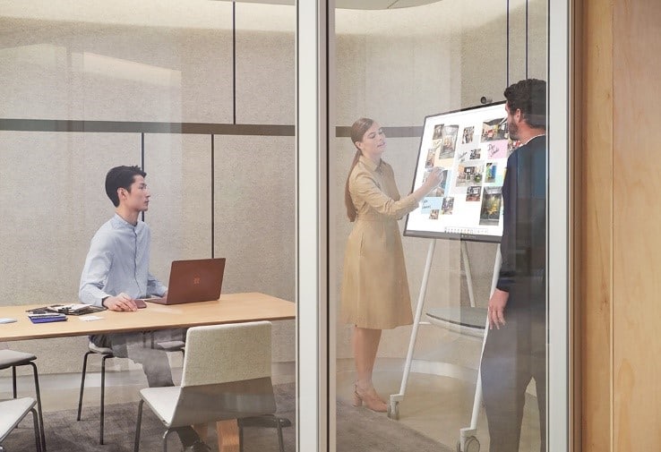 people collaborating with ms surface hub 2s