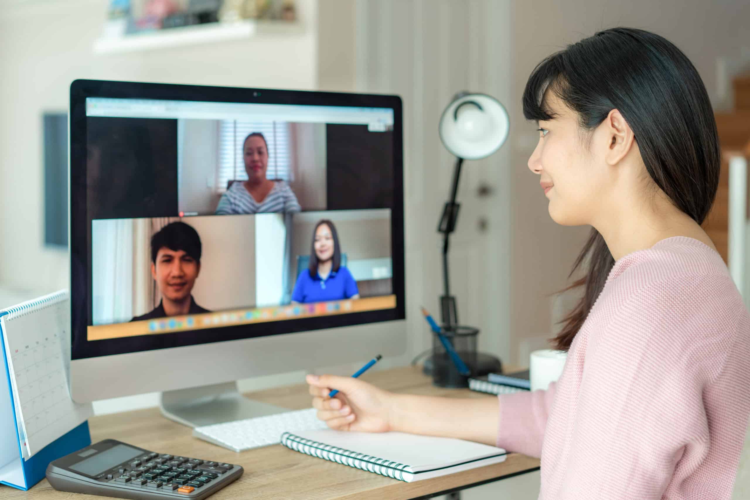 woman at home in online training class