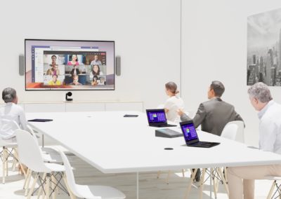 Large conference room with people on video call