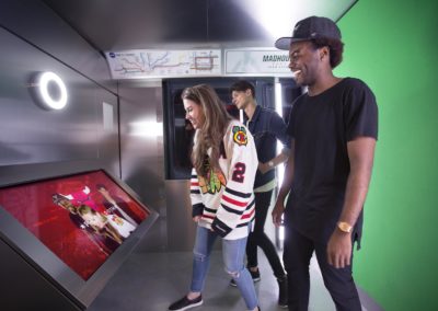 People using digital signage in Chicago Bulls team store