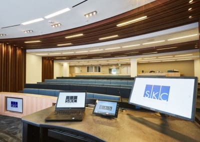 Kiewit auditorium with Crestron control and Samsung monitor