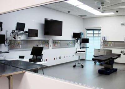 KU Medical Center Health Education Building Mock Exam Room with Multiple Displays