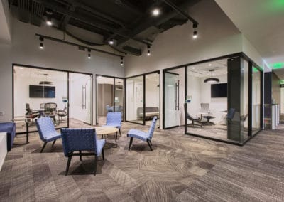 Kiewit meeting spaces featuring Crestron control and Samsung displays