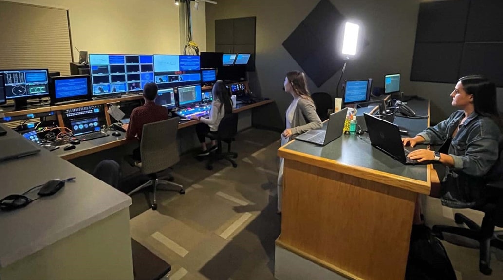 AVI-SPL VideoLink's video production team in a broadcast control room providing enterprise video support.