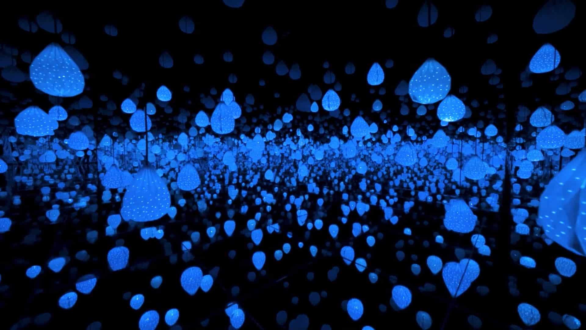 Abstract digital image of glowing blue raindrops in dark space, creating depth and infinite reflection; varied sizes, evenly dispersed.