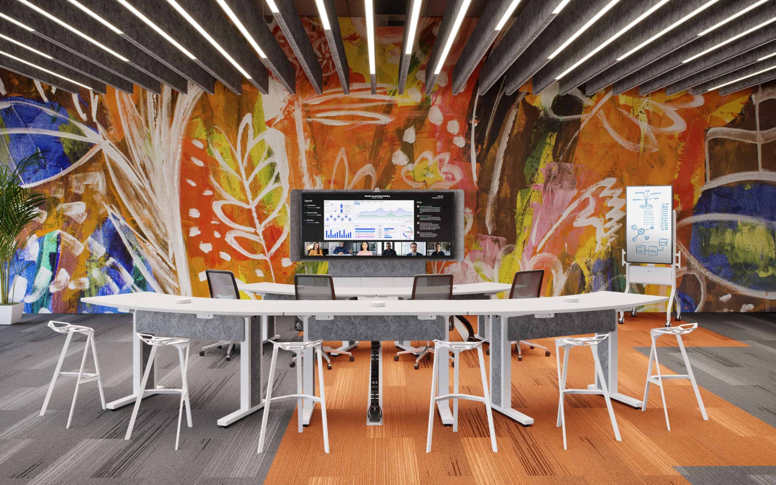 A modern room with a curved table, white seats, large screen, abstract floral art, and parallel overhead lights.