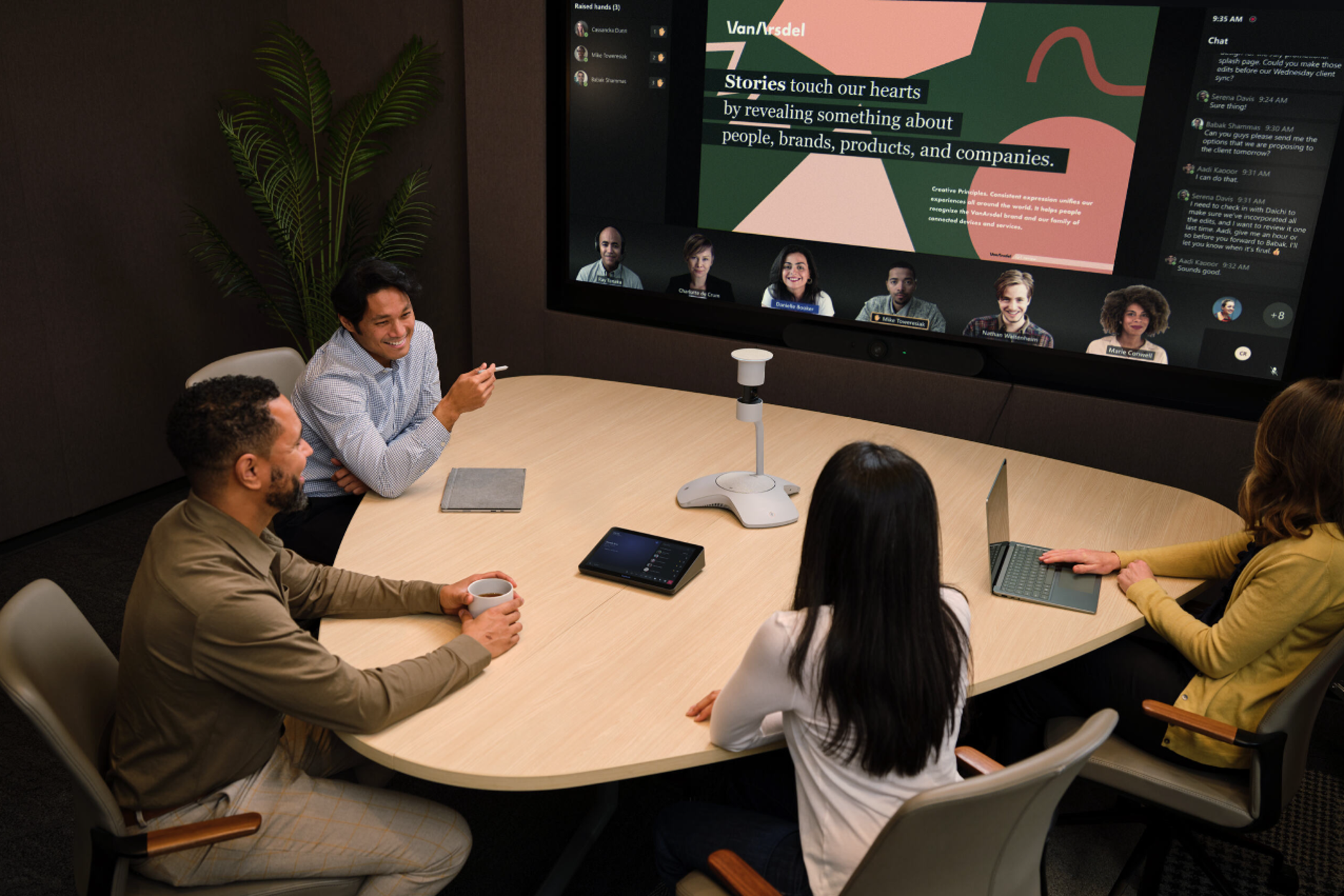 Coworkers in hybrid collaboration space with Microsoft Teams meeting