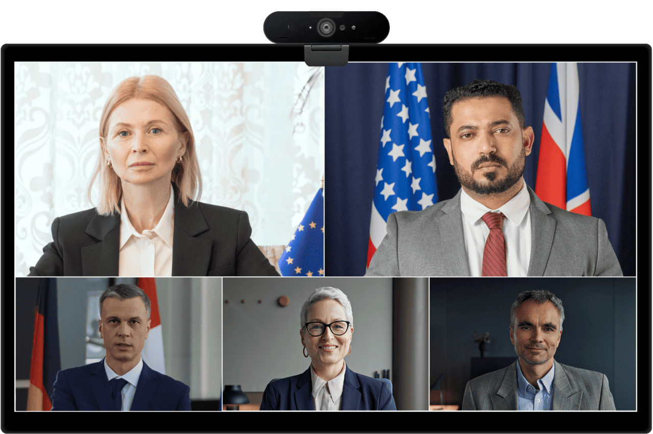 Five professionals in a video call: top two with flags for international feel, bottom three indoors with unique backdrops.