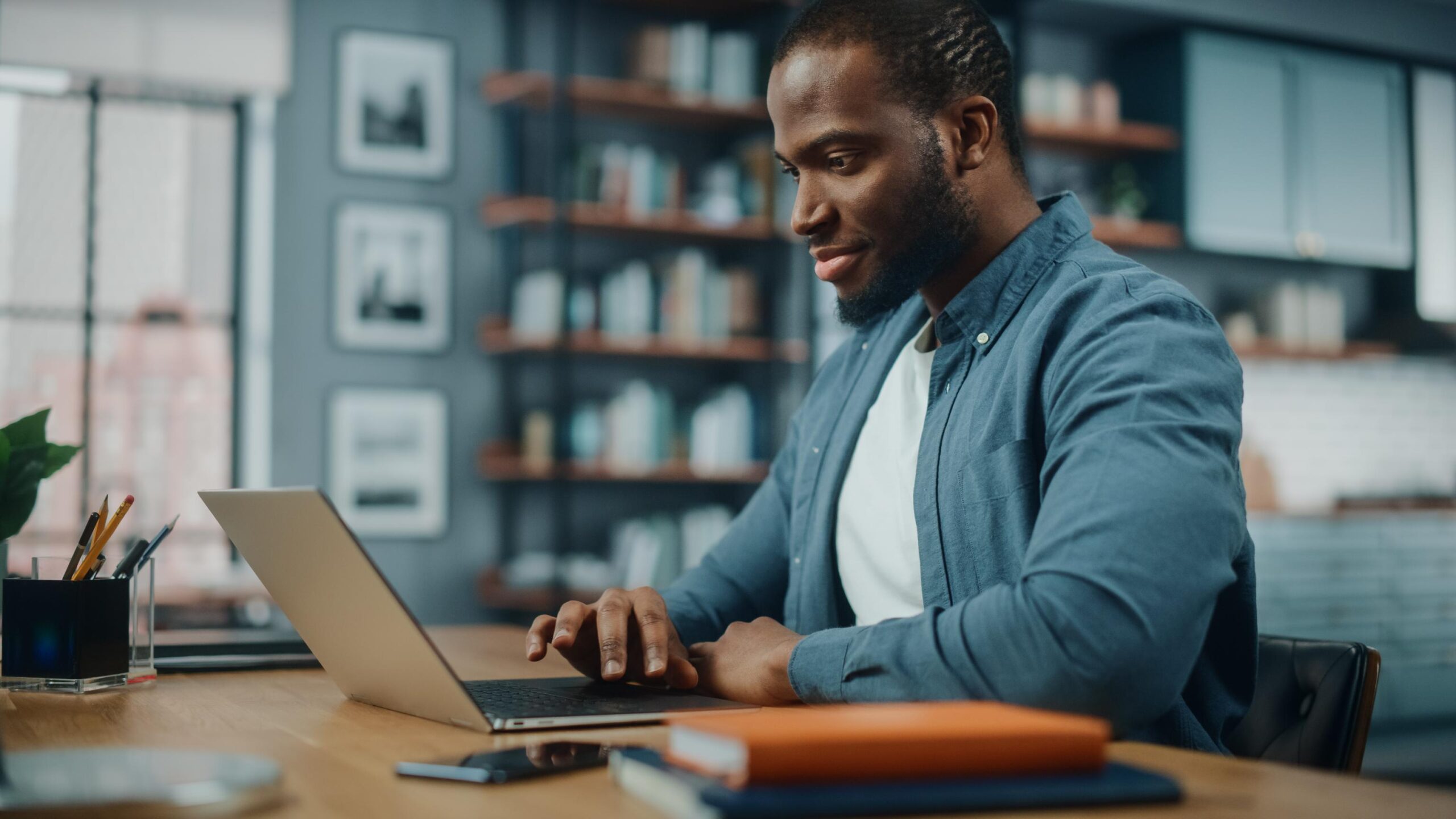 Man watching Symphony demo on a laptop