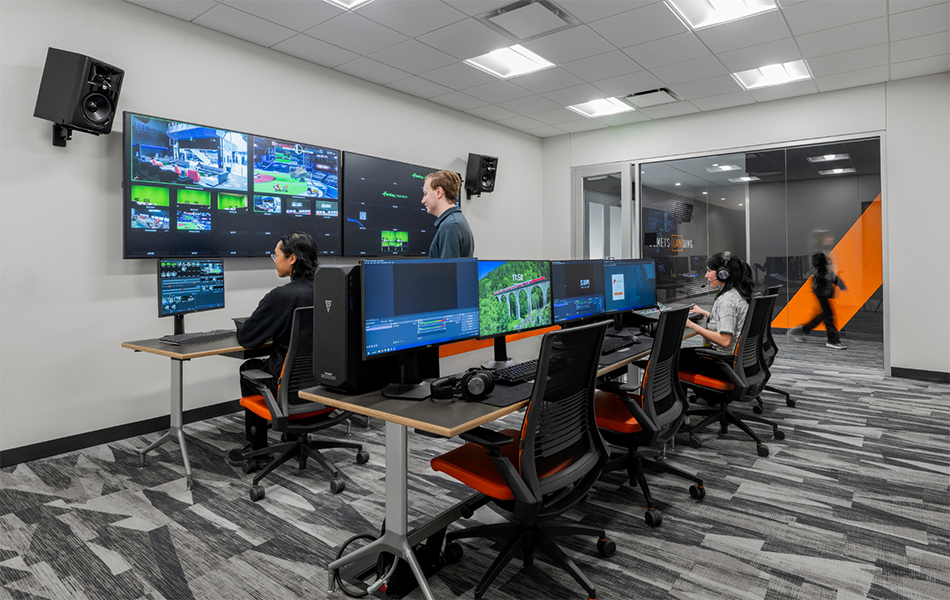 Students working in Comets LANding production control room Credit - SMITHGROUP
