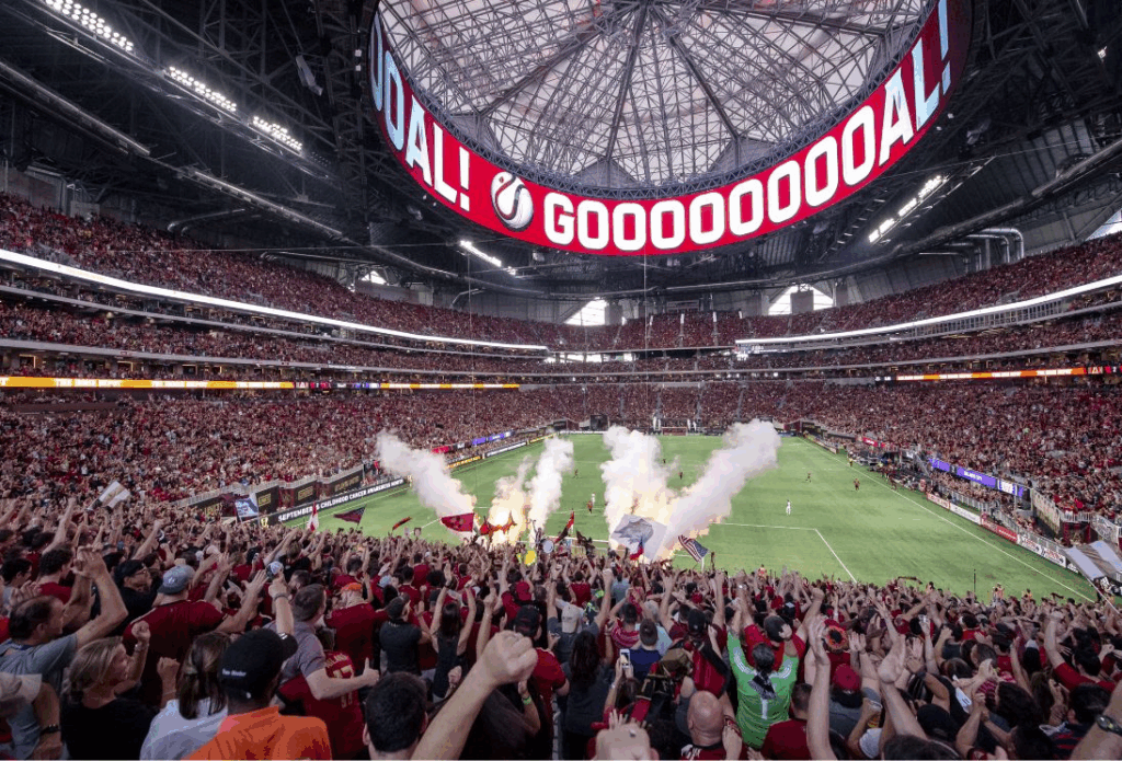 Field and crowd cheering at Mercedes-Benz Stadium