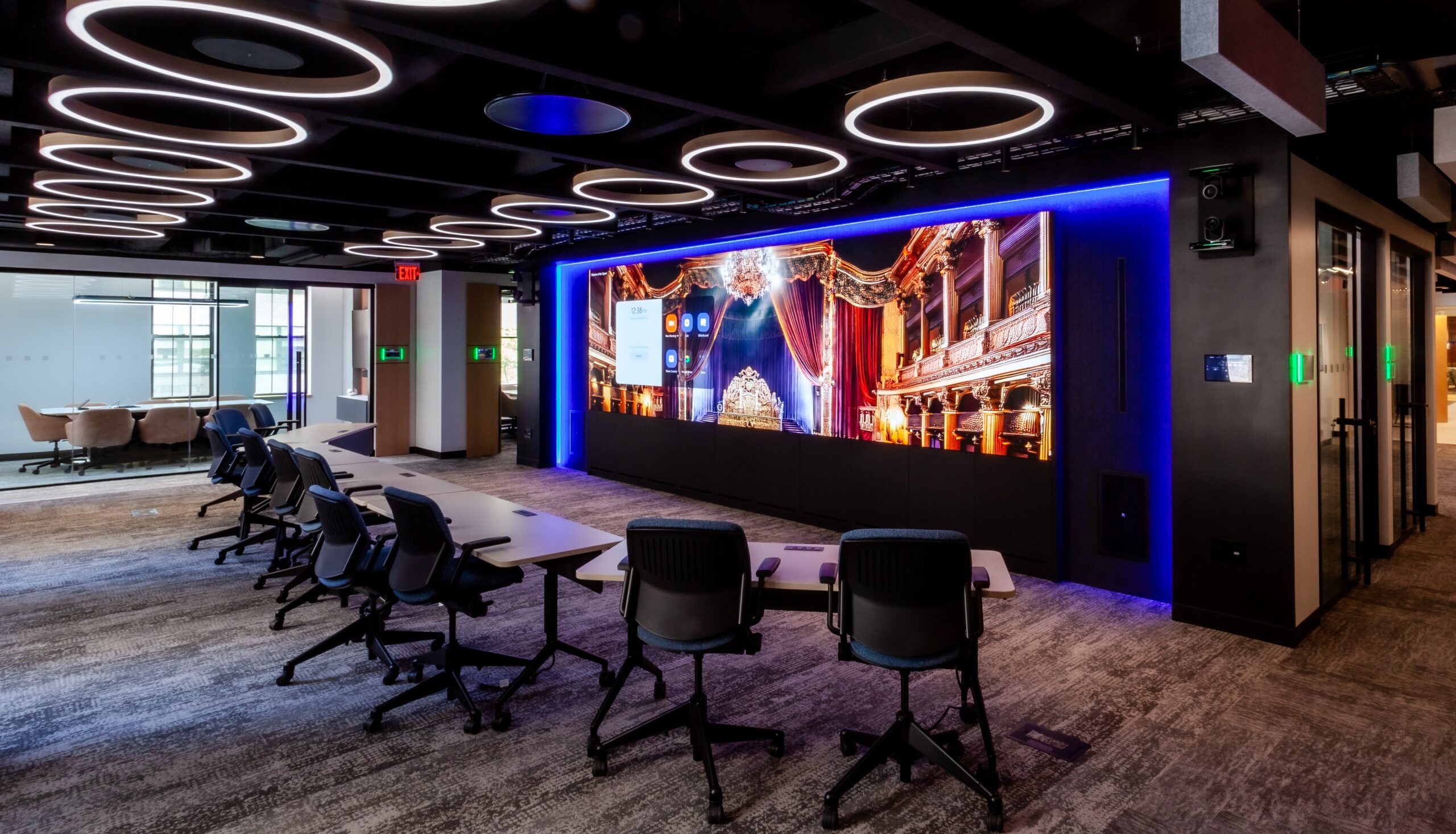 AI-powered meeting room with Crestron Sightline and a video wall