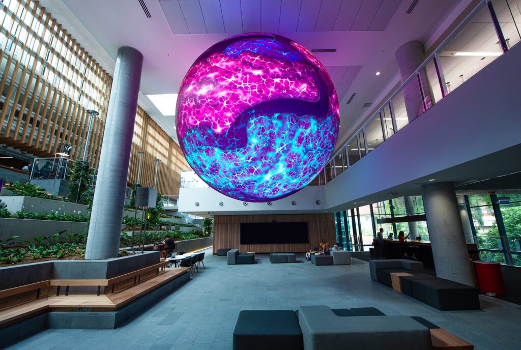 University of Queensland atrium with giant sphere and EdgeMax audio in-ceiling.