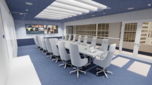 Large conference room with a long table facing two wall-mounted digital displays
