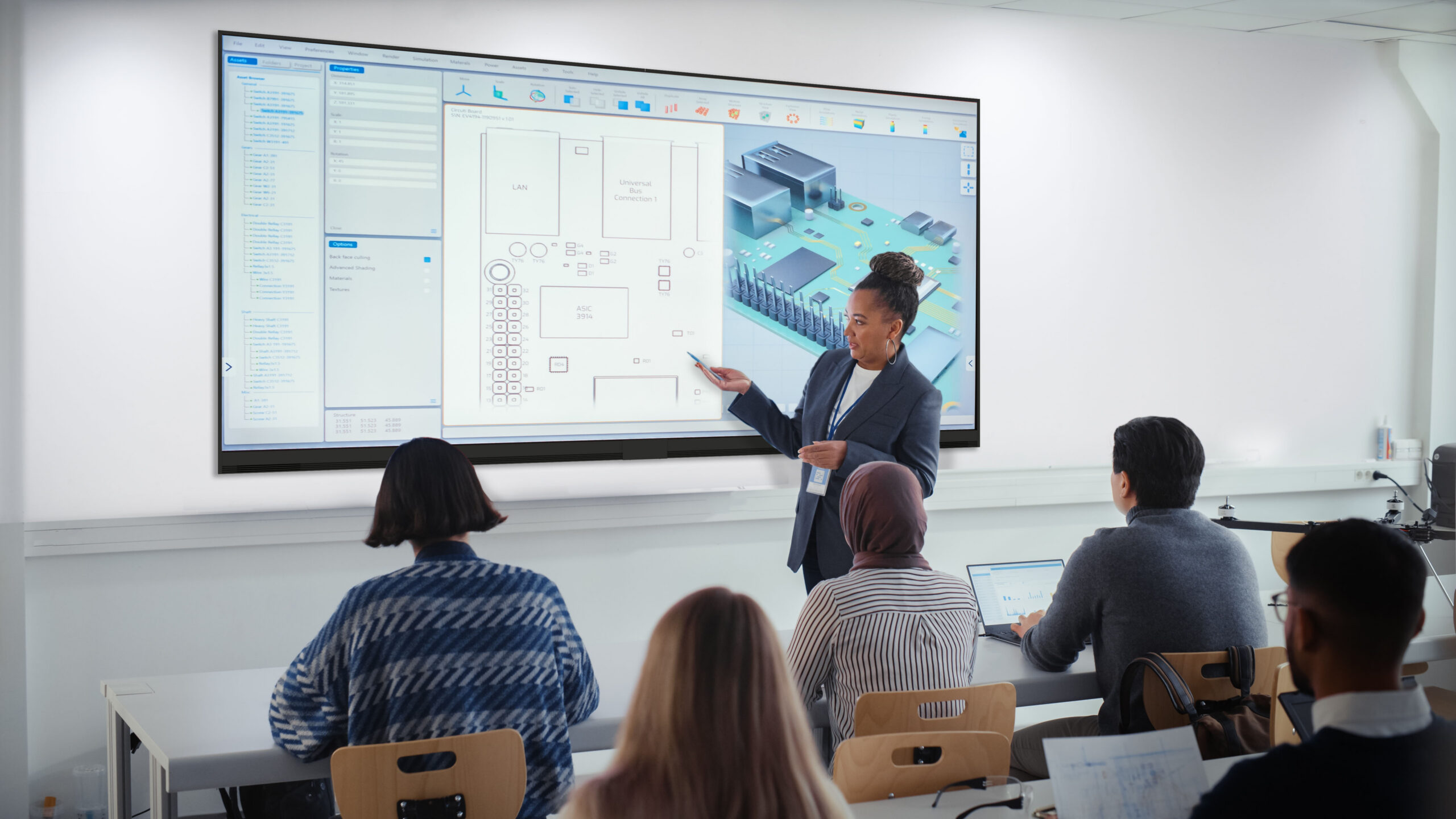 : Instructor using a Planar large-format display to present visual course content to students in a higher education classroom.